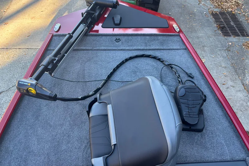 Slide: The Image of 2026 Tracker Bass Tracker Classic XL boat deck with seat and trolling motor. - 7