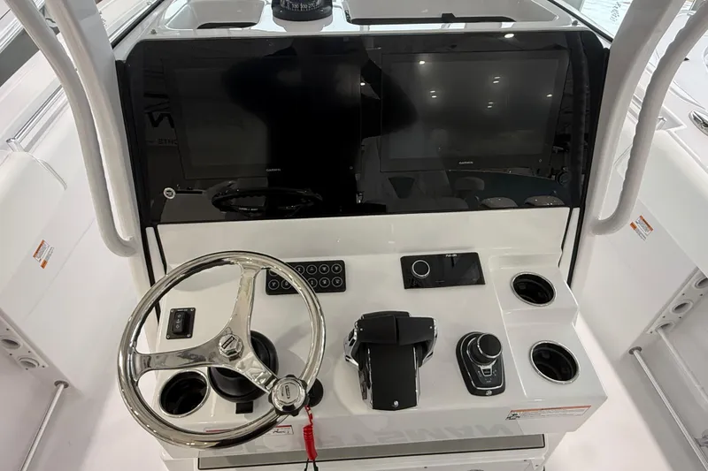 Slide: The Image of 2026 Sportsman Open 282 Center Console dashboard with steering wheel and dual displays. - 4