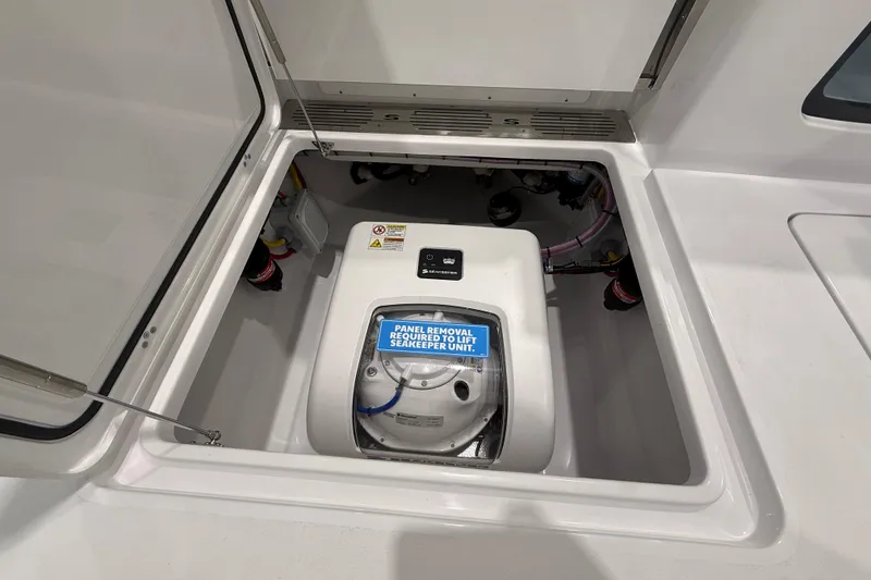 Slide: The Image of 2026 Sportsman Open 282 Center Console engine compartment with Seakeeper unit. - 7