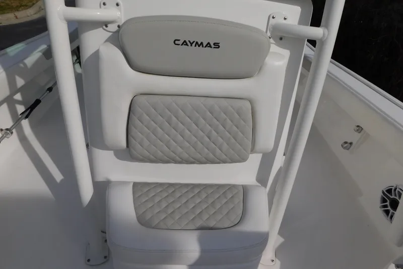 Slide: The Image of 2023 Caymas 28 HB boat seat with quilted gray and white upholstery. - 13