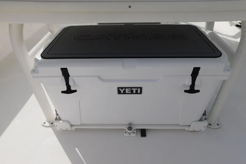 Slide: The Image of 2023 Caymas 28 HB boat with Yeti cooler on deck. - 27