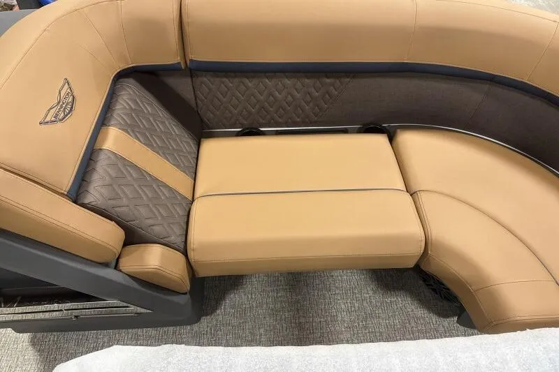 Slide: The Image of 2026 Bennington 22 MSBSF boat interior with tan and brown cushioned seating. - 10