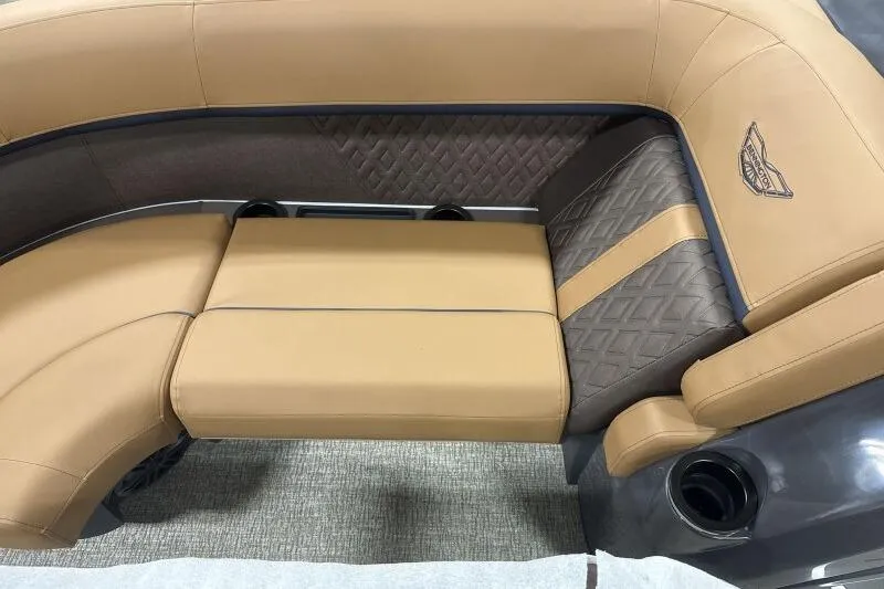 Slide: The Image of 2026 Bennington 22 MSBSF boat interior with tan and brown seating, quilted design. - 11