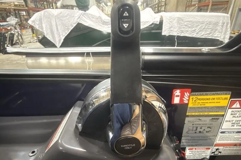 Slide: The Image of Throttle control of 2026 Bennington 22 MSBSF boat with capacity labels visible. - 15