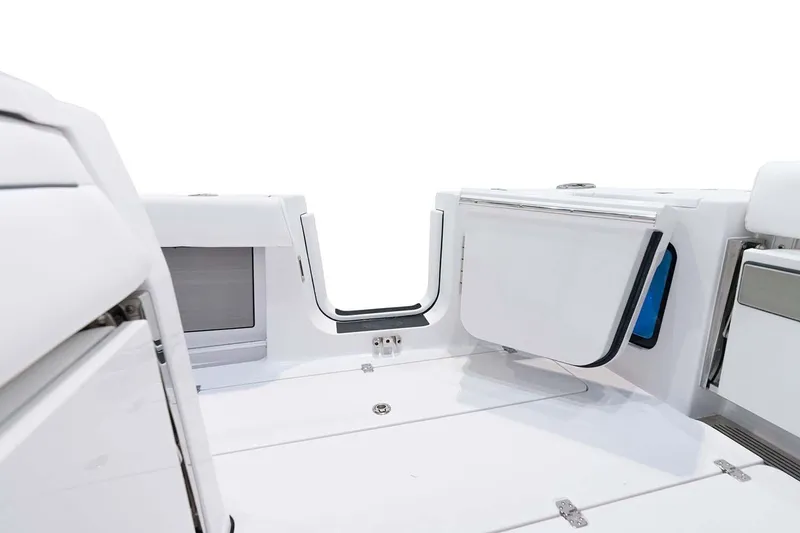 Slide: The Image of Manufacturer Provided Image: 2025 Sportsman Open 352 Center Console interior with storage compartments. - 3