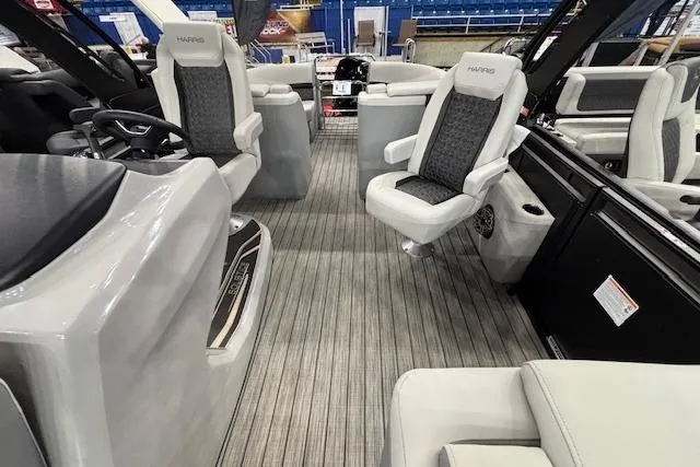 Slide: The Image of Interior of 2026 Harris Solstice 230 CWDH boat with modern seating and sleek design. - 11