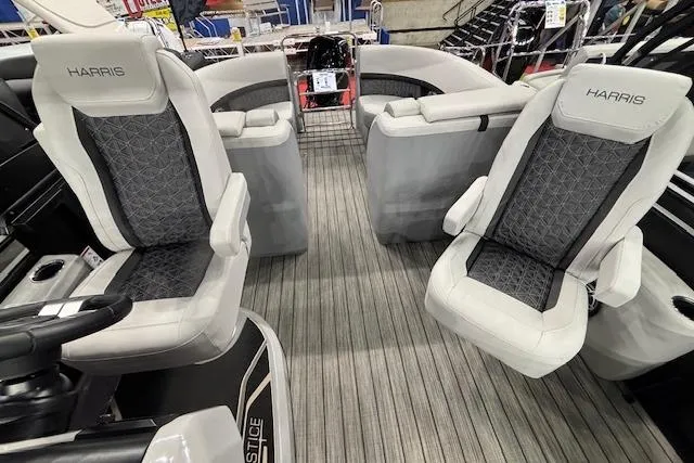 Slide: The Image of 2026 Harris Solstice 230 CWDH boat interior with luxurious seating and modern design. - 12