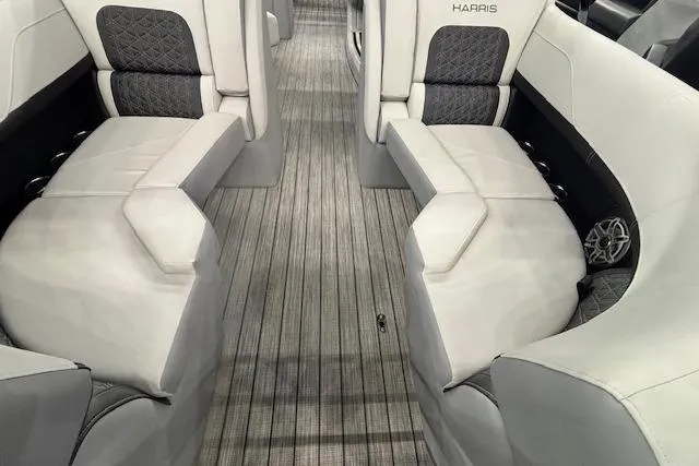 Slide: The Image of 2026 Harris Solstice 230 CWDH boat interior with luxurious seating and modern design. - 17