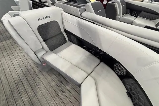 Slide: The Image of 2026 Harris Solstice 230 CWDH boat interior with luxurious seating and modern design. - 7