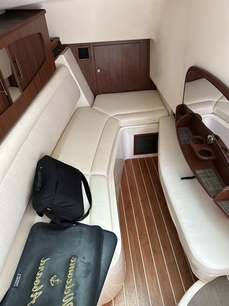 Slide: The Image of 2017 Grady-White Freedom 375 cabin interior with seating and wooden flooring. - 20