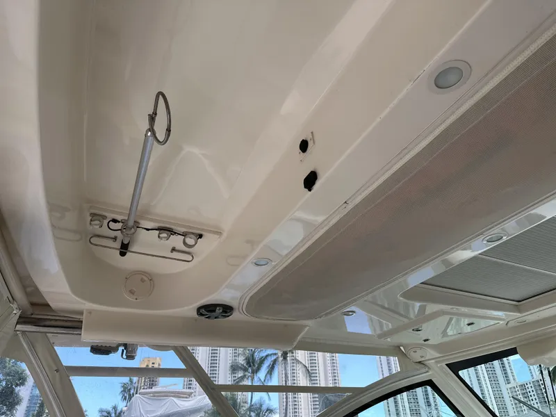 Slide: The Image of 2017 Grady-White Freedom 375 boat interior ceiling with hatch and lighting. - 27