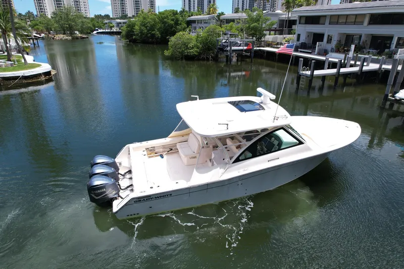 Slide: The Image of 2017 Grady-White Freedom 375 boat cruising in a scenic marina. - 4