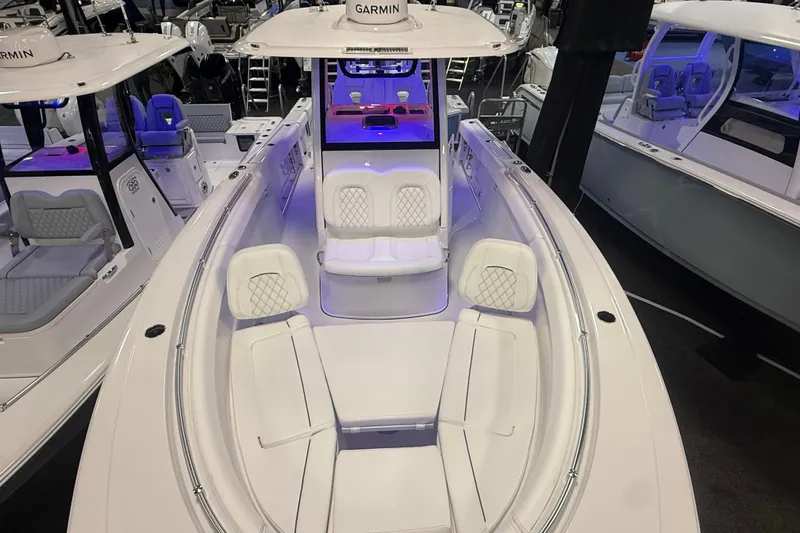 Slide: The Image of 2026 Sportsman Open 302 Center Console boat with spacious seating and modern design. - 5