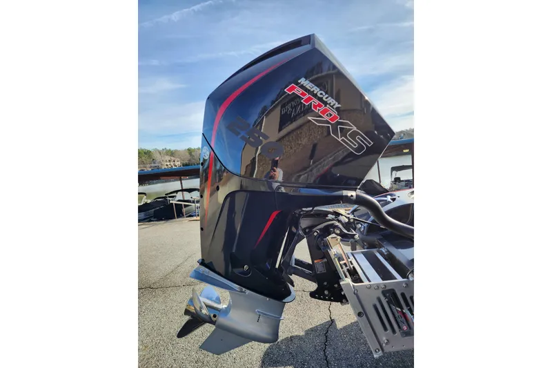 Slide: The Image of 2021 Nitro Z20 boat with Mercury Pro XS outboard motor, docked outdoors. - 6