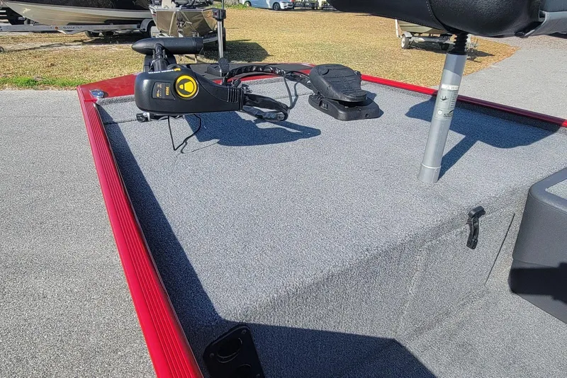 Slide: The Image of 2024 Tracker Bass Tracker Classic XL boat deck with trolling motor and seat. - 10