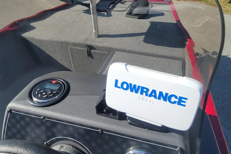 Slide: The Image of 2024 Tracker Bass Tracker Classic XL dashboard with Lowrance Hook fish finder. - 16