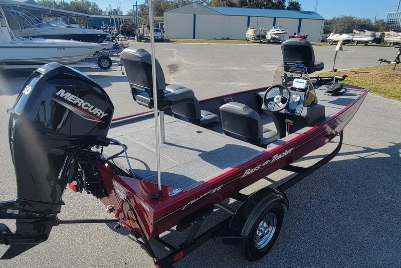 Slide: The Image of 2024 Tracker Bass Tracker Classic XL boat with Mercury engine on trailer. - 3