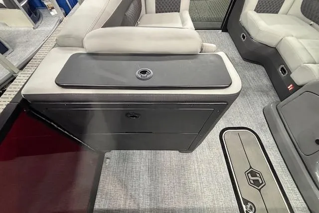 Slide: The Image of 2026 Harris Sunliner 230 interior with sleek seating and modern design. - 26