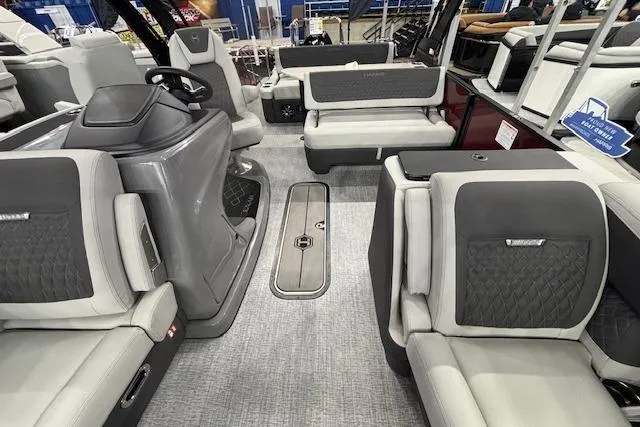 Slide: The Image of 2026 Harris Sunliner 230 interior with luxurious seating and modern design. - 5