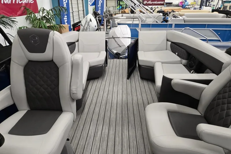Slide: The Image of 2026 Harris Sunliner 230 pontoon boat interior with luxurious seating and modern design. - 12