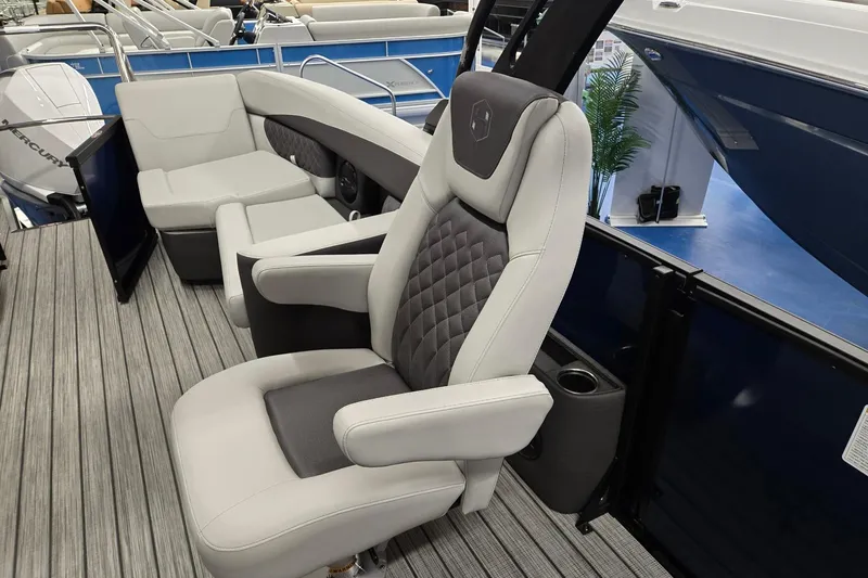 Slide: The Image of Luxurious seating on 2026 Harris Sunliner 230 boat with modern design and comfort. - 13