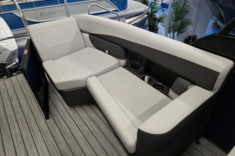 Slide: The Image of 2026 Harris Sunliner 230 boat interior with luxurious seating and modern design. - 22