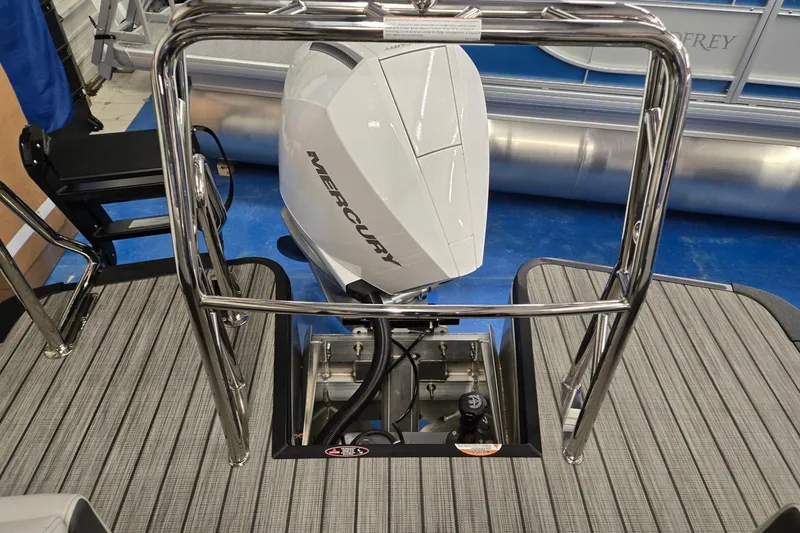 Slide: The Image of 2026 Harris Sunliner 230 boat with Mercury outboard motor, rear view. - 24