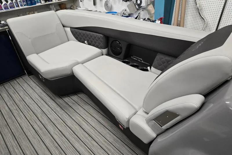Slide: The Image of Luxurious seating in 2026 Harris Sunliner 230 boat, featuring modern design and comfort. - 33