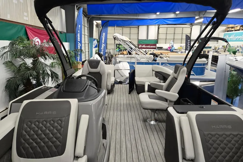 Slide: The Image of 2026 Harris Sunliner 230 pontoon boat interior with luxurious seating and modern design. - 9