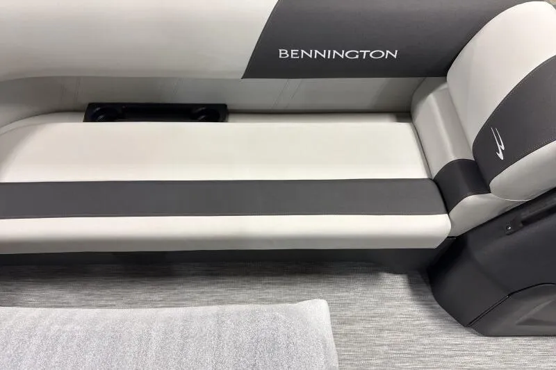 Slide: The Image of 2026 Bennington 22 SSBSF boat interior seating, featuring sleek gray and white upholstery. - 10