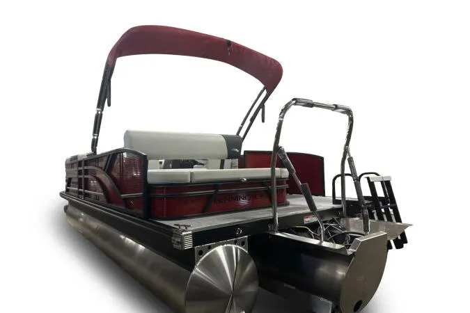 Slide: The Image of 2026 Bennington 22 SSBSF pontoon boat with red canopy and sleek design. - 6
