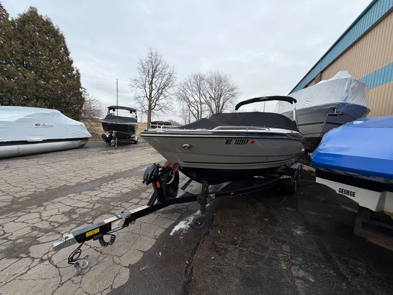 The Image of 2019 Monterey 224FS boat parked on trailer outdoors. - 0