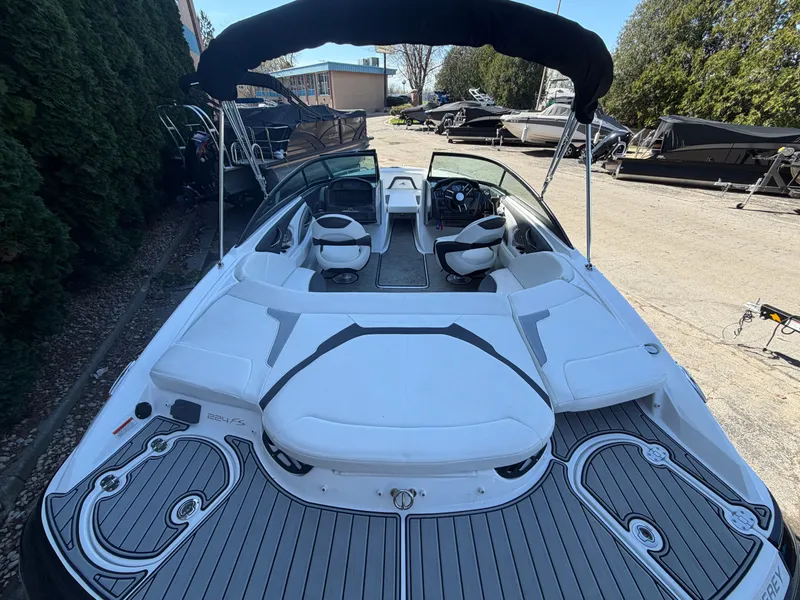 Slide: The Image of 2019 Monterey 224FS boat with luxurious interior and sunshade. - 17