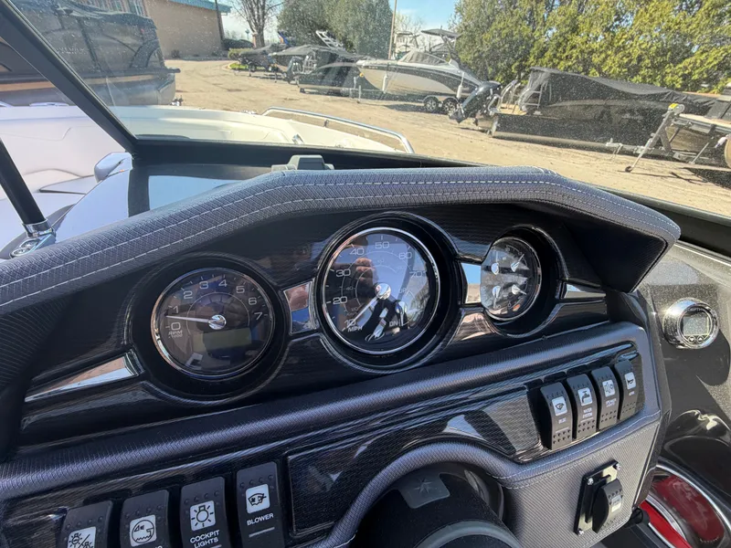 Slide: The Image of Dashboard of a 2019 Monterey 224FS boat with speedometer. - 23