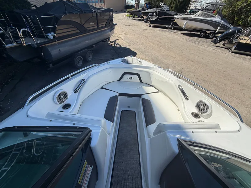 Slide: The Image of 2019 Monterey 224FS boat, bow view in outdoor setting. - 31