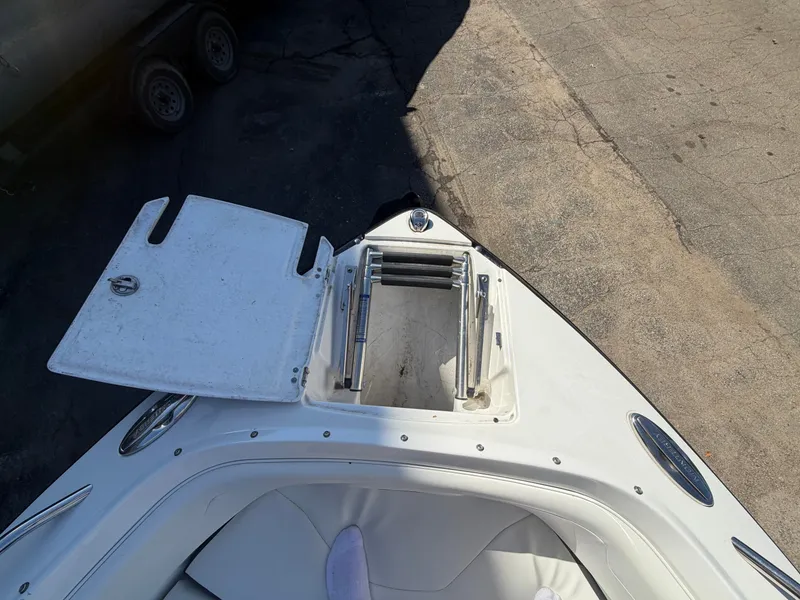 Slide: The Image of Bow of a 2019 Monterey 224FS boat with open hatch. - 33