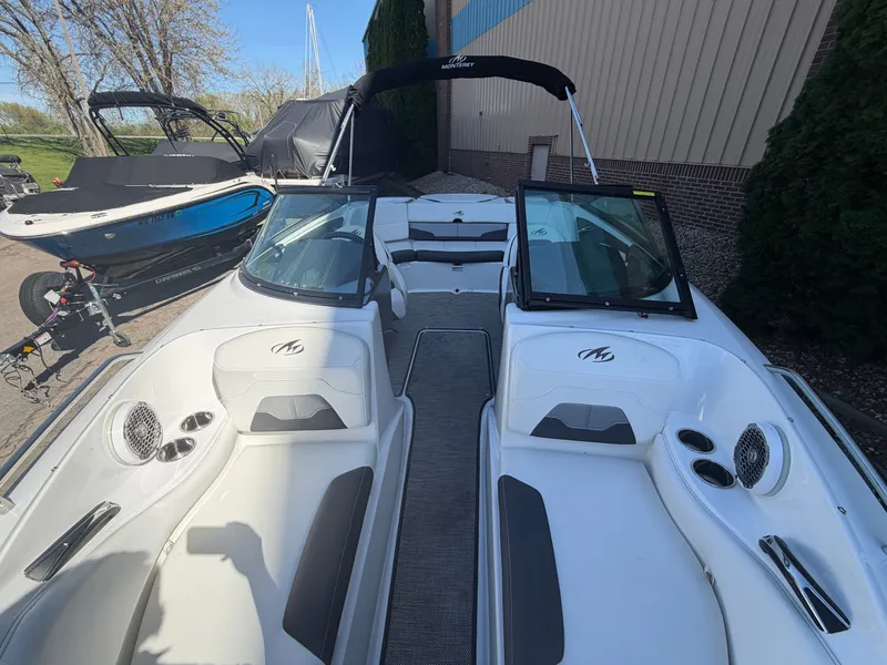 Slide: The Image of Interior view of a 2019 Monterey 224FS boat outdoors. - 34