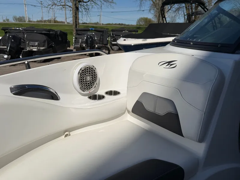 Slide: The Image of Interior of a 2019 Monterey 224FS boat with speaker and cup holders. - 35