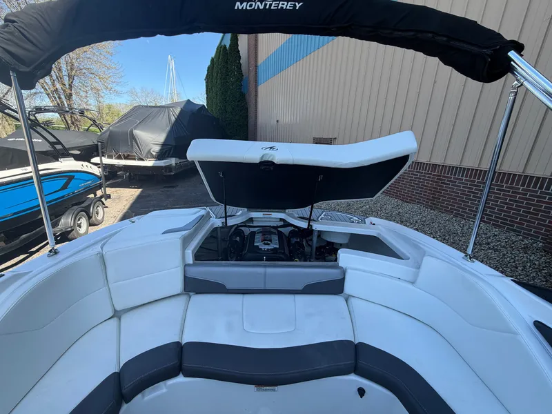 Slide: The Image of 2019 Monterey 224FS boat with open engine compartment. - 39