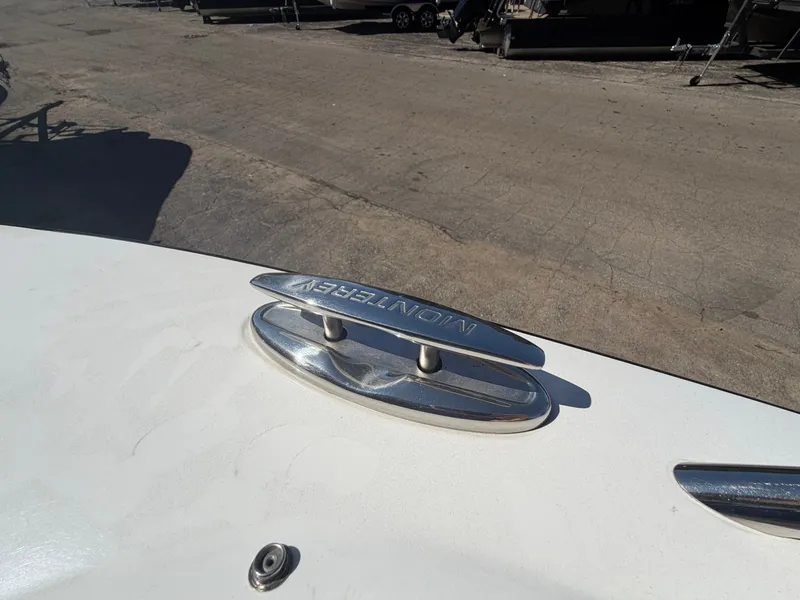 Slide: The Image of Monterey 224FS 2019 boat cleat on deck in a marina. - 43