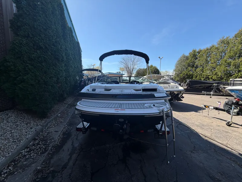 Slide: The Image of Rear view of a 2019 Monterey 224FS boat outdoors. - 48