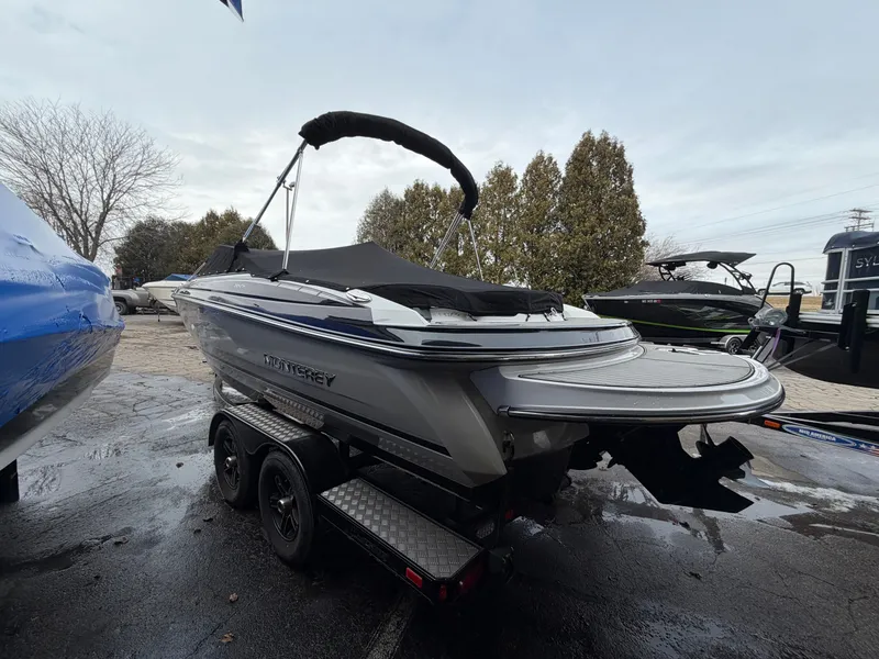 Slide: The Image of 2019 Monterey 224FS boat on trailer, outdoor display. - 6
