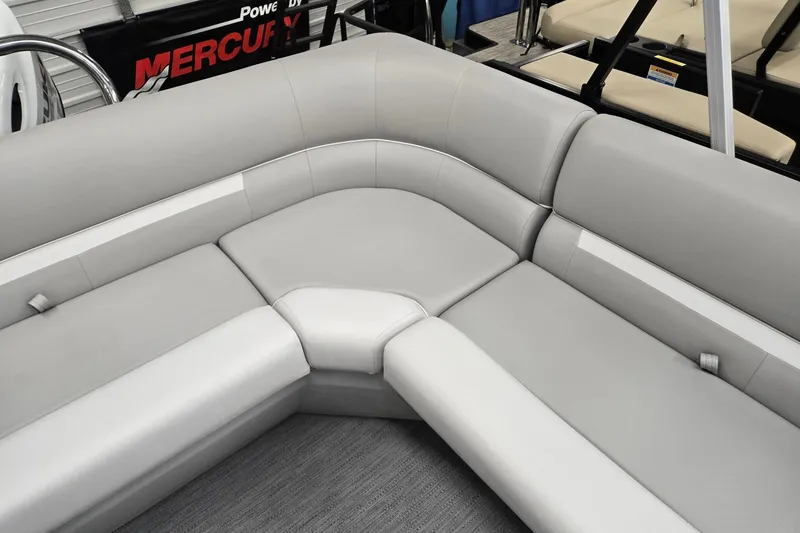 Slide: The Image of Luxurious seating on 2026 Godfrey EX 2086 CX pontoon boat, featuring sleek gray upholstery. - 11