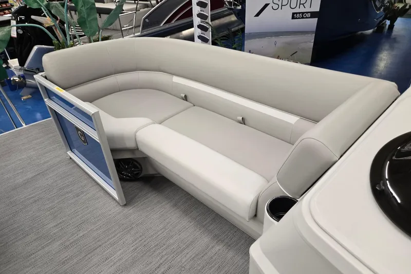Slide: The Image of Luxurious seating on 2026 Godfrey EX 2086 CX pontoon boat, featuring modern design and comfort. - 16