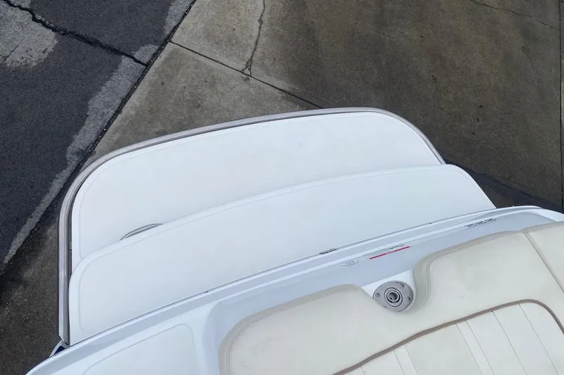 Slide: The Image of 2008 Cobalt 222 boat swim platform and seating, viewed from above on concrete surface. - 14