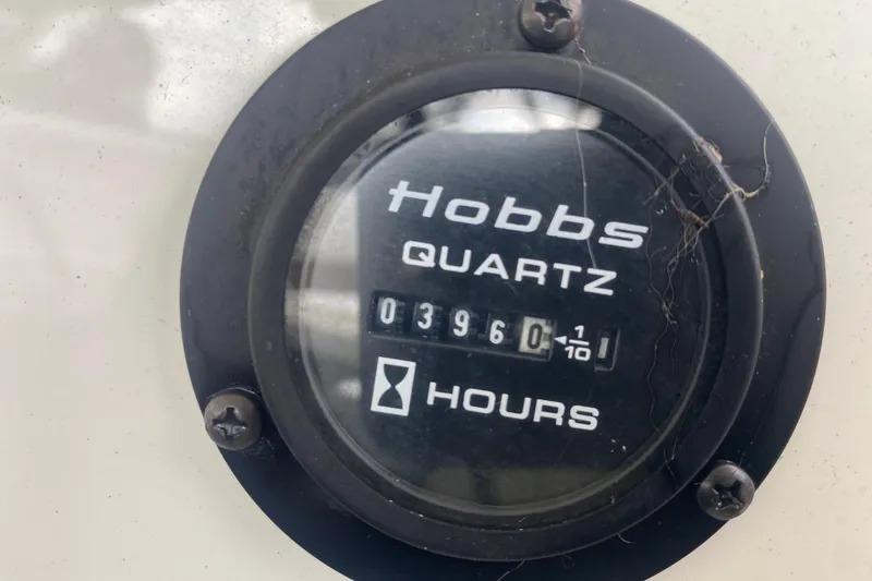 Slide: The Image of Hobbs Quartz hour meter showing 396 hours on a 2008 Cobalt 222. - 16