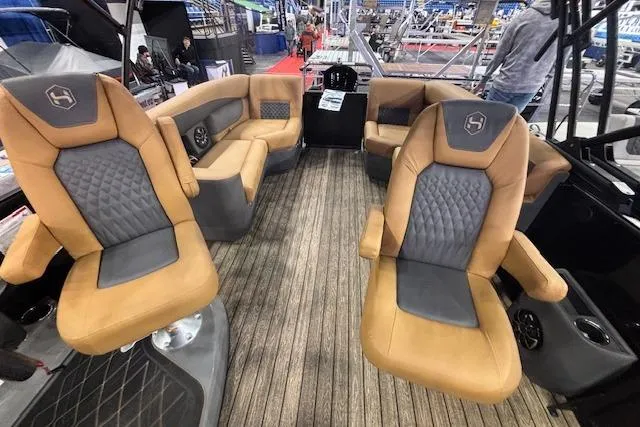 Slide: The Image of 2026 Harris Sunliner 230 interior with luxurious seating and modern design. - 10