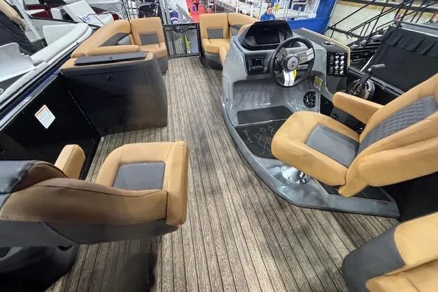 Slide: The Image of Interior of 2026 Harris Sunliner 230 boat with tan seating and modern dashboard. - 14