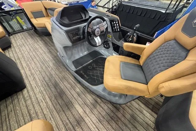 Slide: The Image of 2026 Harris Sunliner 230 boat interior with modern helm and luxurious seating. - 15