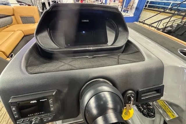 Slide: The Image of 2026 Harris Sunliner 230 dashboard with modern controls and display screen. - 17